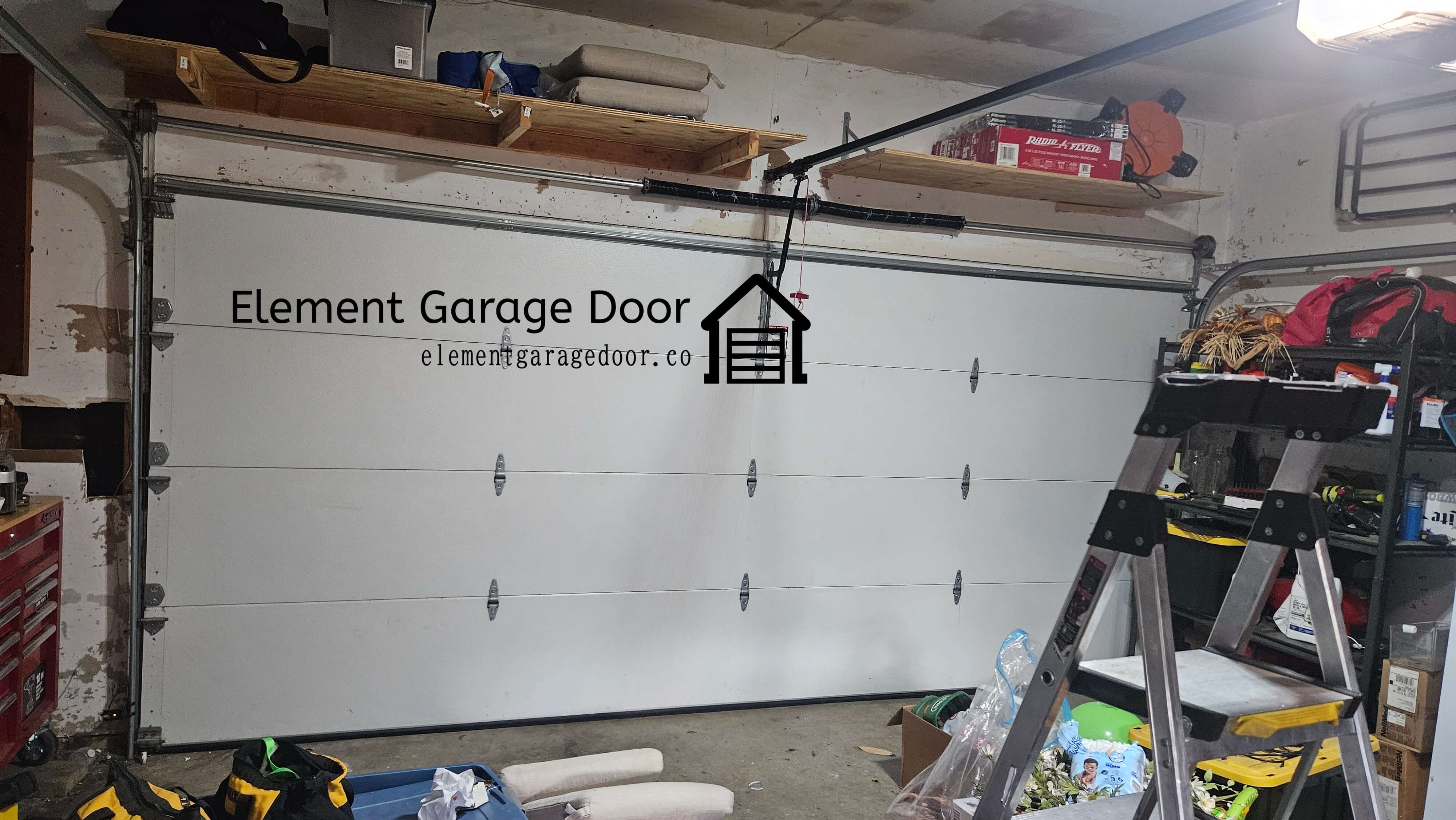 elementgaragedoor.com_steelback_garage_door_spring_replacement