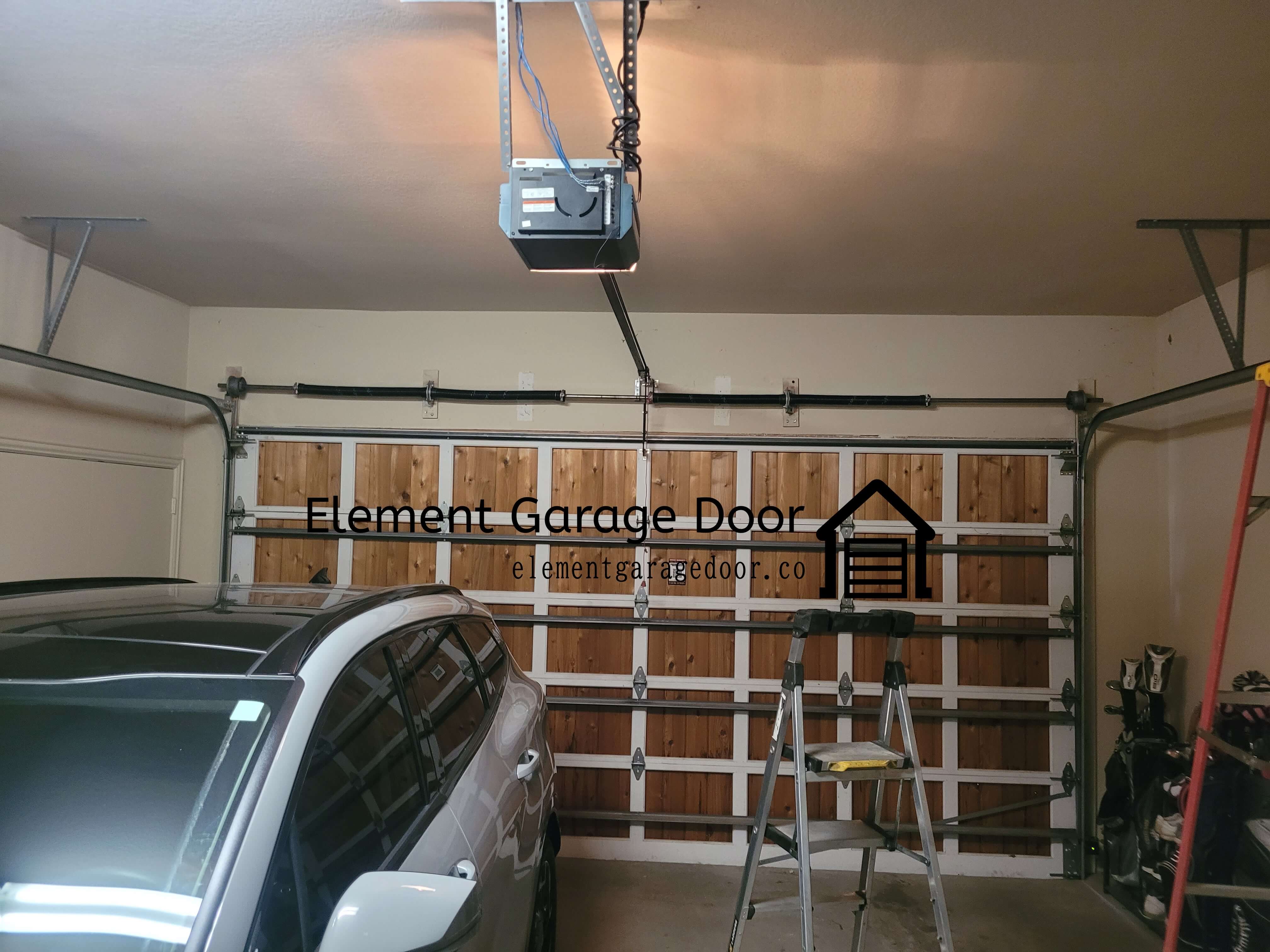 elementgaragedoor.com_wood_garage_door_spring_replacement